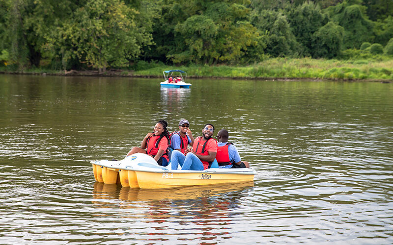 Fours teens in a boat