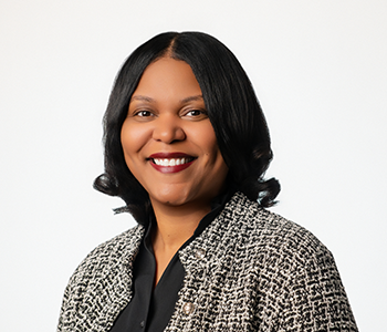 Black woman smiling at camera